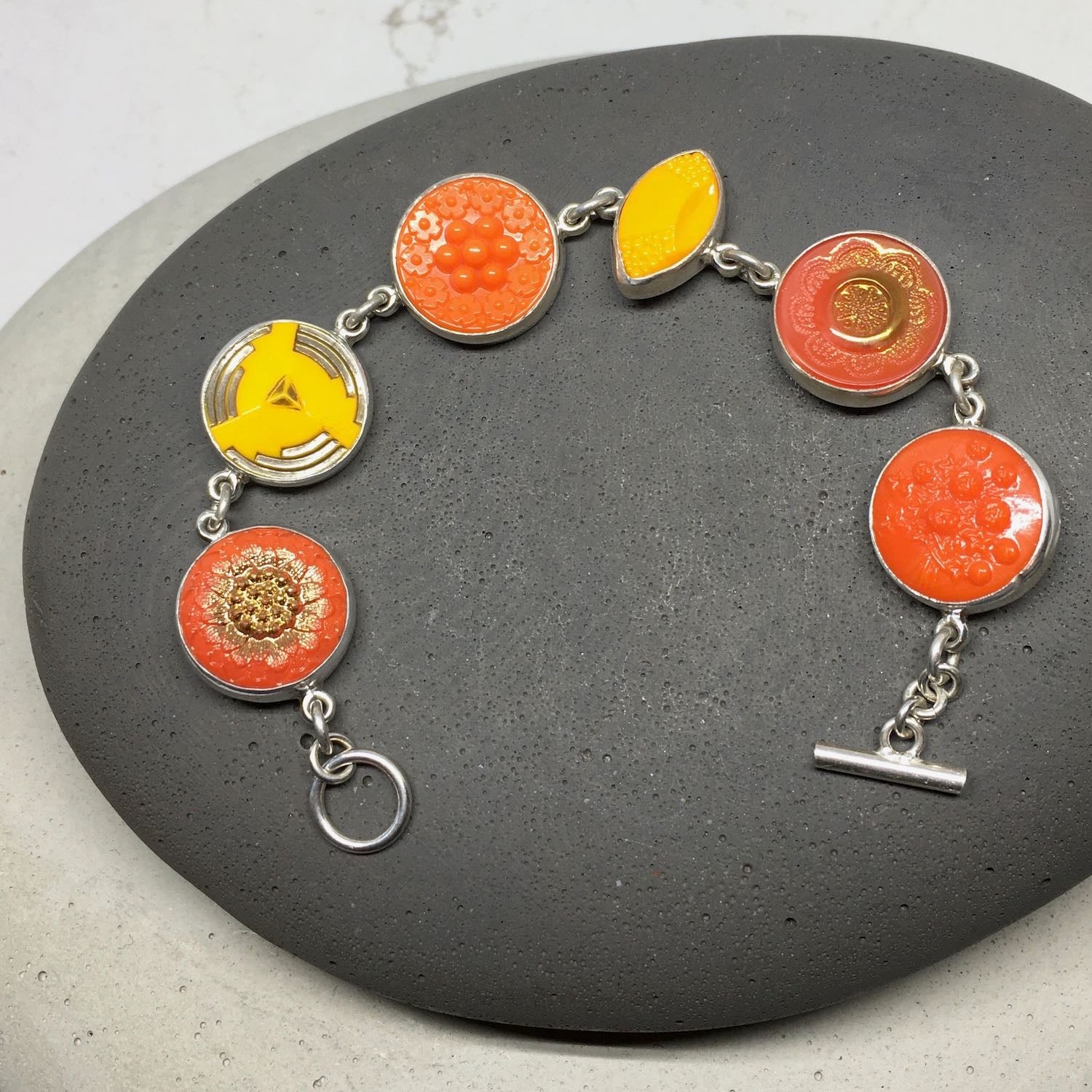 Gold button sales bracelet
